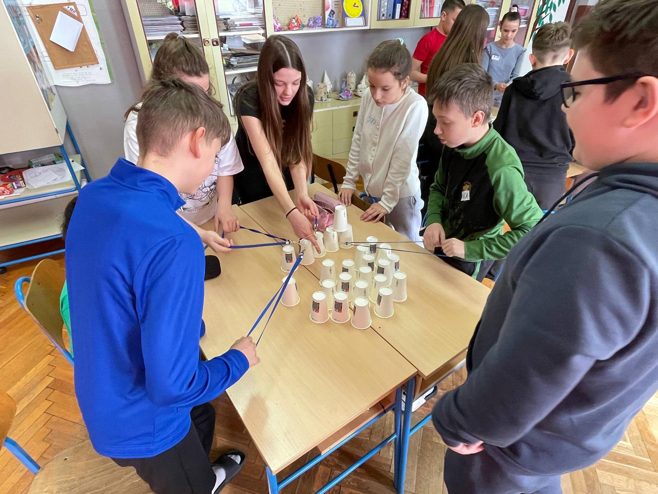 Students working together in a peace education activity